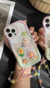 قاب موبایل ( آیفون ) قورباغه و نیلوفرآبی + بندست بابونه