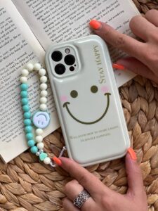 قاب موبایل آیفون هپی فیس بالشتی + بندست