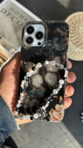 قاب موبایل آیفون پروانه ترنسپرنت مشکی پولکی طلایی - تصویر 3