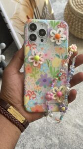 قاب موبایل ( آیفون ) گل بابونه رنگی رنگی برجسته + بندست - تصویر 3