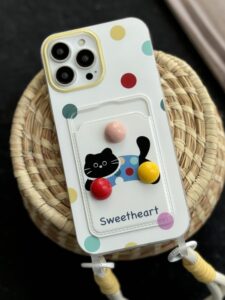 قاب موبایل آیفون گربه خوش قلب توپی جاکارتی بنددار