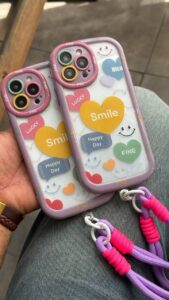 قاب موبایل آیفون لبخند قلبی محافظ لنزدار + بندست - تصویر 3