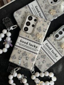 قاب موبایل ( آیفون - سامسونگ - شیائومی ) گل شانس صدفی + بندست - تصویر 3