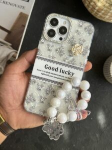 قاب موبایل ( آیفون - سامسونگ - شیائومی ) گل شانس صدفی + بندست