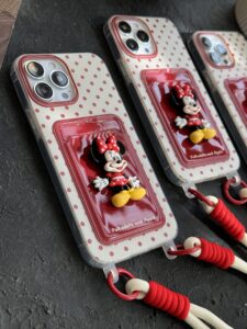 قاب موبایل آیفون میکی برجسته خال خالی جاکارتی بنددار - تصویر 3