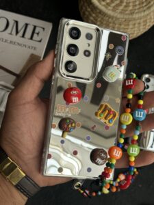 قاب موبایل ( آیفون - سامسونگ ) ام اند ام M&M آیینه ای بنددار - تصویر 2