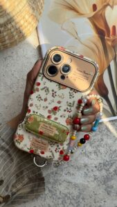 قاب موبایل موبایل آیفون استرابری گاردن + بند و استند ست